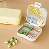 Organizador de pastillas portátil, un recipiente sellado para almacenar y dispensar medicamentos, perfecto para llevar pastillas contigo durante toda la semana, con compartimentos para cada día de la semana y para tres comidas al día
