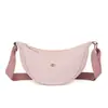 Bolso bandolera de nailon para mujer 2026 nuevo bolso de moda tipo albóndiga ligero pequeño bolso de hombro bolso de axila versátil bolso de hombro de lona