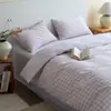 Juego de cuatro piezas de algodón puro a rayas estilo japonés, juego de sábanas y fundas de edredón 100% algodón modelo nuevo 2026, juego de tres piezas para ropa de cama de dormitorio estudiantil