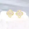 Pendientes de botón Ins de alta calidad, súper brillantes, con forma de trébol de cuatro hojas de la suerte, de circonita, para mujer, moda coreana y japonesa, nuevos pendientes de temperamento de lujo ligero