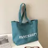 Bolso de hombro casual de lona con estampado de letras estilo ins coreano para mujer, nuevo modelo 2026, bolso tote de gran capacidad