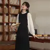 Vestido Midi Manga Longa com Amarração Patchwork Artístico Francês Falso Duas Peças Saia Longa Versátil Novo Outono 2026