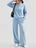 Conjunto casual deportivo de dos piezas para mujer, moda otoño e invierno 2026, transfronterizo europeo y americano, holgado, manga larga, top y pantalones de pierna ancha