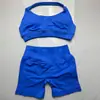 En Stock Dfyne Mismo Estilo Conjunto de Yoga de Alta Elasticidad Sujetador Halter y Conjunto de Shorts Conjunto de Yoga Fitness sin Costuras