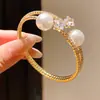 Pulsera minimalista de estilo coreano con estrella de circón y perla, una pieza de joyería única y exquisita, un accesorio ligero y moderno que complementa cualquier atuendo, disponible al por mayor
