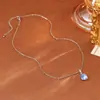 Directo de Fábrica Pendientes de Zirconia Azul Ardiente Moda de Lujo Ligero Anillo de Estilo Romántico Atmósfera Simple de Gama Alta