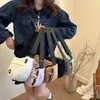 2025 Nueva Marca de Moda Bolso Cruzado para Mujer Mochila Pequeña Bolso de Hombro de Moda Estilo Hong Kong para Mujer Color Sólido Bolsa para Teléfono Móvil Ins para Mujer