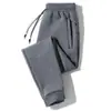 Calças Casuais Masculinas Primavera Outono Inverno Calças Esportivas Engrossadas Calças Skinny Largas Tamanho Plus Calças Longas de Cor Sólida