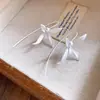 Brincos Gancho com Pingente de Flor Pintada em Spray de Metal 2026 Novo Estilo Brincos de Luxo Leve de Alto Padrão Brincos de Nicho Únicos com Temperamento para Mulheres