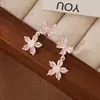 Nuevos Pendientes 2025 Zirconia Incrustada Pendientes de Flor y Mariposa Colgante Largo Fresco Accesible Lujo Bobina de Mosquito Clip para Oreja