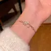 Pulseira de Flor em Zircônia Micro-Incustada Exquisita de Luxo Leve de Nicho para Mulheres, Elegante e Versátil, Pulseira Estilo Puxar Joias no Atacado