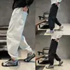 Pantalones casuales cómodos y versátiles de corte tridimensional estilo americano, nuevo modelo de otoño, pantalones casuales simples para hombre con cordón y cintura elástica