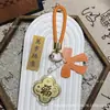 Llavero de oro puro 999, trébol de cuatro hojas dorado, cadena para teléfono móvil, colgante para bolso, regalo promocional cultural y creativo, hecho a medida