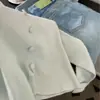 Suéter azul con cuello de muñeca ribeteado de encaje con capa base para mujer, nuevo top de punto de alta gama Otoño e Invierno 2025