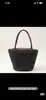 Bolso tejido de paja con un diseño elegante, conveniente para viajar en verano, bolso de mano al hombro, sombrero de protección solar, bolso tejido de paja