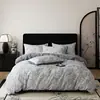 Nuevo juego de ropa de cama de cuatro piezas de gasa doble estampada, grado A, apto para bebés y madres, ropa de cama tejida estampada de doble capa para todas las estaciones