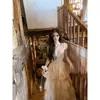 Un Vestido Escarlata Dulce de Melocotón con Detalles Intrincados, Cuello en V, Sin Tirantes, Ajustado, Vestido Largo para Mujer