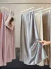 Falda larga de estilo francés de alta gama, con cola de pez, de satén de acetato perlado, para mujer, nueva colección de otoño, falda midi versátil y estilizada