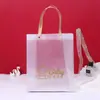 Bolsa de mão transparente de PP bolsa de embalagem para presente bolsa de presente de mão à prova d'água corda plana bolsa de mão fosca logotipo impresso personalizado