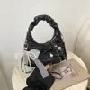 Bolso Tote Cadena Lazo Moda Verano 2026 Nuevo Estilo Plegado Diseño de Nicho Bolso Cruzado Bolso Versátil para Mujer