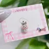 Pendientes de Hueso de Oreja con Forma de Lazo de Perla de Concha de Acero de Titanio de Moda con Temperamento Lindo Dulce Color Caramelo para Mujeres