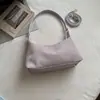 Otoño 2026 Nuevo Estilo Coreano Retro Color Sólido Simple Bolso de Hombro Tipo Dumpling Bolso de Mano para Viajes de Negocios Gamuza Bolso de Hombro de Moda