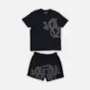 Marca de moda estilo americano SYNA WORLD Traje de manga corta estilo taladro High Street Hip Hop Ins Verano Pantalones cortos casuales para hombres y mujeres