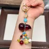 Cera de Abeja de Segunda Generación Varios Estilos Oso Bolsa de Queso Colgante Llavero DIY Exquisito Adorno de Joyería
