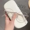 Nuevo marco de gafas metálico poligonal retro artístico pequeño, marco de gafas liso de moda Danyang al por mayor, se puede equiparar con lentes graduados