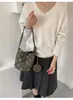Bolsa feminina de camurça 2026 nova tendência moda outono bolsa de mão poá bolsa de ombro tipo balde retrô para o dia a dia