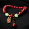 Pulsera Guofeng de Venta Caliente Transfronteriza Hebilla Ping An Carácter de la Suerte Dragón Dorado Colgante de Nuo Noodles Accesorios Exquisitos Pulsera Roja