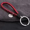 Al por Mayor Punto Creativo Cuerda de Cuero Trenzada Círculo Único Llavero Muñeca Bola de Pelo Llavero Accesorios para Llaves Joyería