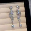 Pendientes Largos de Borla Perla de Lujo Ligero de Nicho de Gama Alta para Mujer Mismo Estilo que las Socialités Moda Versátil Elegantes Pendientes de Circonita