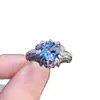 Anel de topázio, qualidade de corpo inteiro, excelente fogo. Tamanho da pedra principal 8*8mm. Exquisitamente cravejado em prata 925.