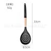 Novos utensílios de cozinha de silicone em estoque com cabo de madeira conjunto de 10 peças utensílios de cozinha de silicone preto conjunto de 10 peças utensílios de cozinha