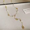 Collar con colgante de cadena de circonita iridiscente, cadena para suéter de lujo ligero de alta gama, cadena retro de nicho, joyería versátil al por mayor para mujer