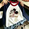 Camiseta infantil de manga comprida com estampa de desenho animado em algodão, gola redonda, estilo coreano, color-blocking, marca moderna, novo top versátil fofo para primavera/outono