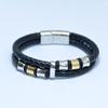 Europa y Estados Unidos pulsera de joyería de venta caliente de acero de titanio tejido de cuero pulsera de cuero de personalidad para hombre de acero inoxidable fabricantes mayoristas T127