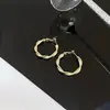 Pendientes de Aro Retorcido Obiya 2.5cm Pendientes de Moda Ins Ventas Nacionales Círculo Transfronterizo