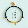 Pulsera tejida a mano con nudo de bambú en color dorado con un diseño simple y de nicho, Lujo ligero, Pulsera de hilo rojo del Año del Caballo