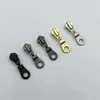 Cremallera Metálica Ykk3Y Genuina con Tirador de Bloqueo Automático Se Puede Usar para Ordinario No. 3 Solapa de Cremallera de Metal Cremallera