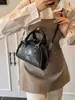 Bolso pequeño de alta gama transfronterizo para mujer, nueva versión coreana 2026, bolso tipo almohada simple, diseño de nicho, bolso de mano, bolso de hombro, bolso cruzado