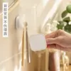 Soporte para cepillos de dientes Montado en la pared Sin perforaciones Colgante de pared Taza para cepillos de dientes A prueba de polvo Drenaje Estante de almacenamiento para cepillos de dientes