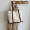 Bolso de Mano Grande Transfronterizo para Mujer 2026 Nuevo Estilo Coreano Moda Bolso de Hombro Combinación Casual Bolso Tote de Lona