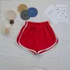 Shorts Deportivos Estilo Americano Verano 2025 Casual Yoga Fitness Chica Atrevida Pantalones de Pierna Ancha Línea A con Bloques de Color Rayas Laterales Pantalones Cortos Atrevidos para Mujer