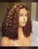 Peluca transfronteriza Moda para chicas europeas y americanas Tocado de fibra química Cabello rizado corto mediano negro Cabello rizado pequeño Peluca rizada africana
