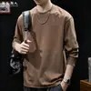 Camiseta Listrada de Manga Longa com Textura Jacquard Masculina Outono 2026 Nova Marca Tendência Gola Redonda Solta Tamanho Grande Camisa Base