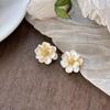 Pendientes de camelia para mujer, ligeros, lujosos, de alta gama, estilo nicho, primavera 2025, suaves y elegantes.