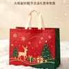 Bolsa de tela no tejida de Guangzhou, bolsa tridimensional de una sola pieza ecológica de gran capacidad con impresión a color y logotipo navideño laminado