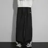Calça de moletom listrada estilo americano, nova coleção de outono, corte solto, com caimento fluido, bordado color-blocking, versátil para esportes e uso casual